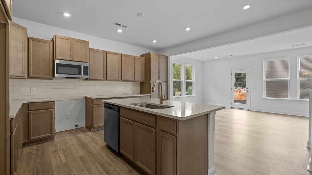 Furnished interior view inside a new home in Leigh Park, Charlotte (Image 3).