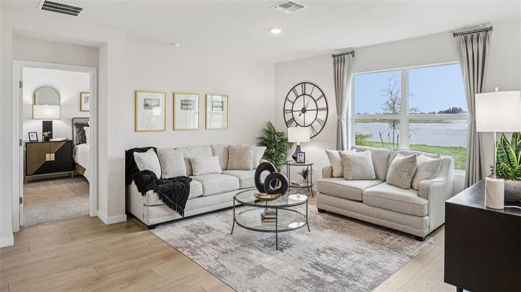Furnished interior view inside a new home in Seagrass - Express & Tradition, Punta Gorda (Image 22). Furnished interior view inside a new home in Seagrass - Express & Tradition, Punta Gorda (Image 22).