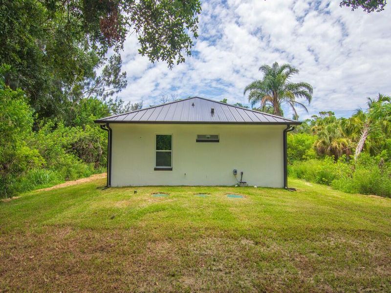 Exterior details and patio area of a home in , Vero Beach (Image 1). Exterior details and patio area of a home in , Vero Beach (Image 1).