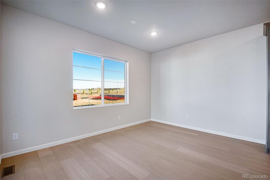 Spacious, unfurnished interior of a new home in Prelude at Sterling Ranch, Littleton (Image 23).