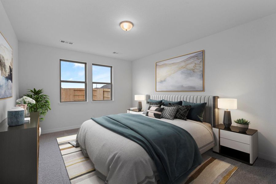 The primary bedroom is generously sized, creating a tranquil and spacious retreat that offers ample room for relaxation. Featuring plush carpet, high ceilings, fresh paint, and large windows that lets in natural lighting throughout the day.