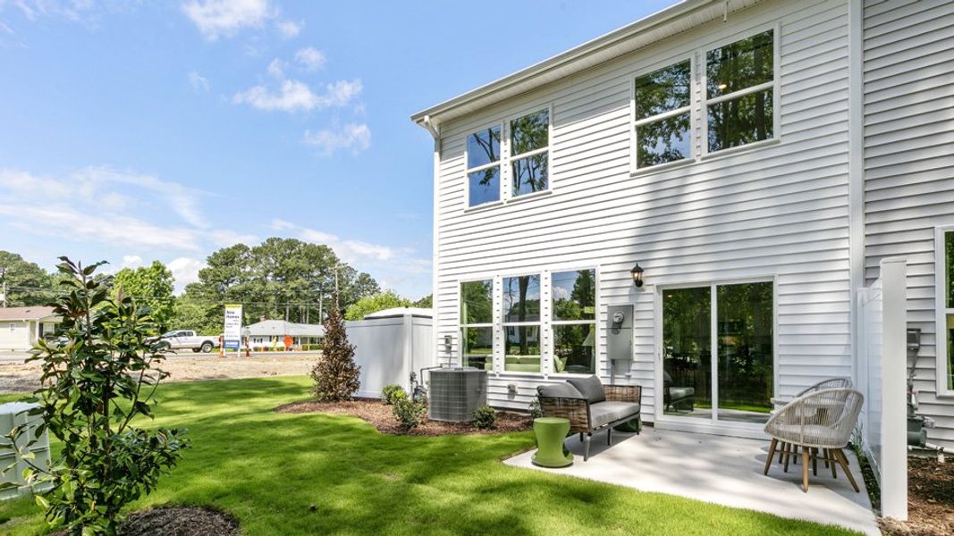 Exterior details and patio area of a home in Chapel Townes, Raleigh (Image 24).