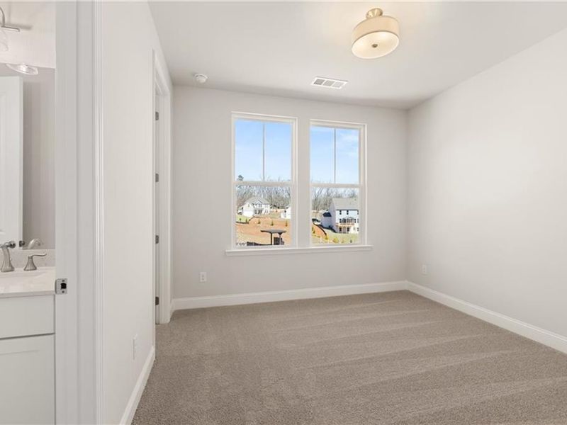 Spacious, unfurnished interior of a new home in Melody Lakeside Estates, Buford (Image 29).