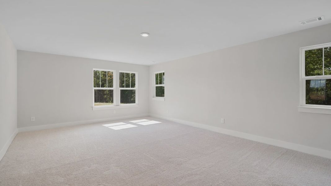 Representative furnished interior of a home built from the Stonefield - Finished Basement by DRB Homes in Pinebrook, Woodruff (Image 17).
