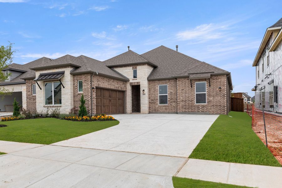 Representative exterior photo of a completed home built from the Henry- 70ft Home Site by Rockwell Homes in Nelson Lake Estates, Rockwall, TX (Image 30). Representative exterior photo of a completed home built from the Henry- 70ft Home Site by Rockwell Homes in Nelson Lake Estates, Rockwall, TX (Image 30).