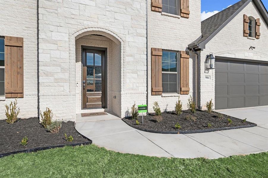 Exterior details and patio area of a home in Parks of Aledo, Aledo (Image 25).