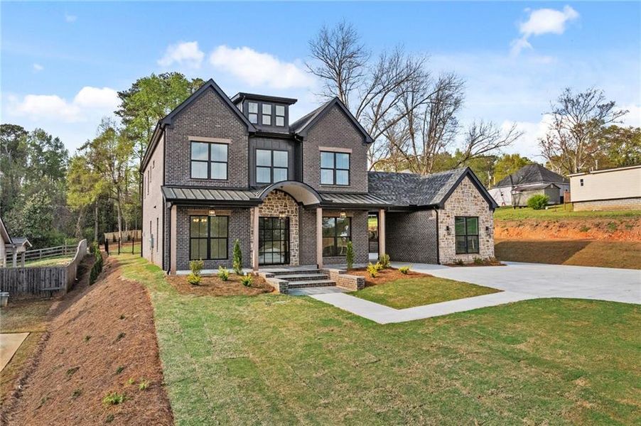 Front exterior of a new home in , Dacula, GA, highlighting curb appeal (Image 26). Front exterior of a new home in , Dacula, GA, highlighting curb appeal (Image 26).