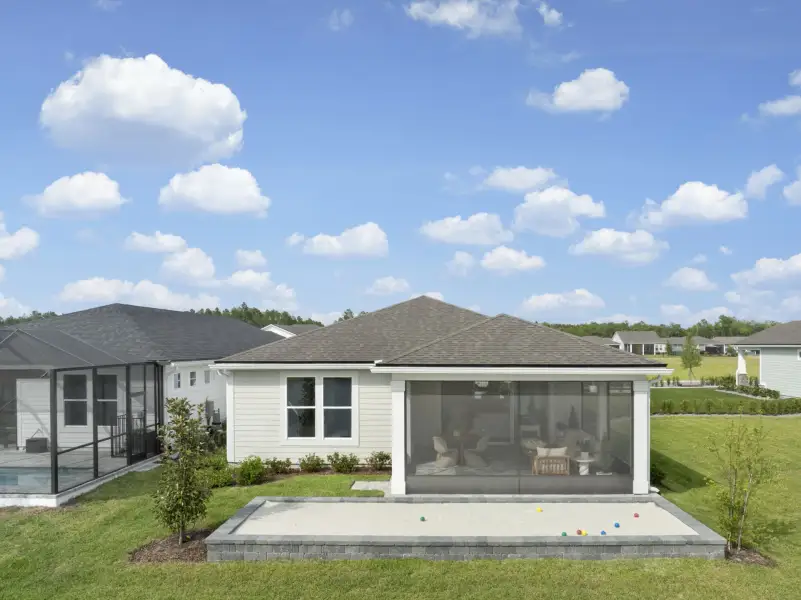 Front exterior of a new home in RiverTown, St. Johns, FL, highlighting curb appeal (Image 14).