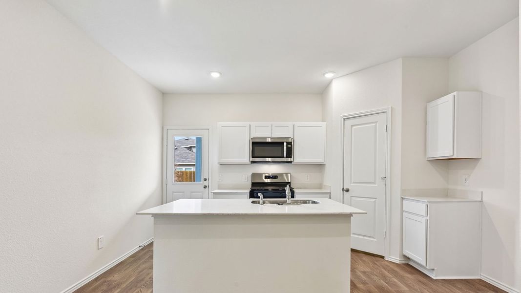 Furnished interior view inside a new home in Wayside, Uhland (Image 6).