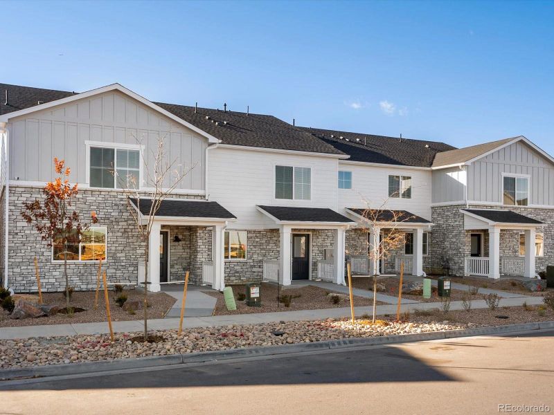 Exterior details and patio area of a home in Skyview at High Point, Aurora (Image 3).