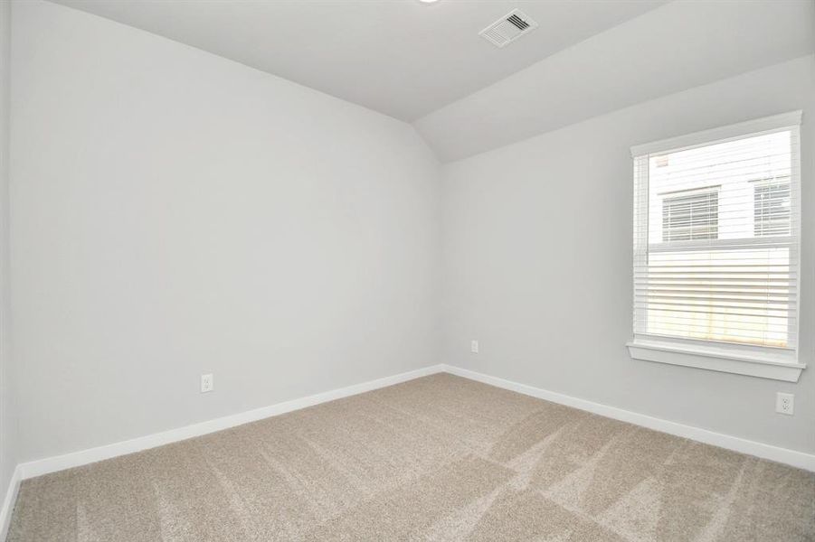 Another view at the secondary bedroom! Sample photo of completed home with similar floor plan. Actual colors and selections may vary.