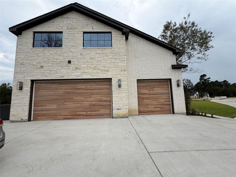 Front exterior of a new home in , Montgomery, TX, highlighting curb appeal (Image 21). Front exterior of a new home in , Montgomery, TX, highlighting curb appeal (Image 21).