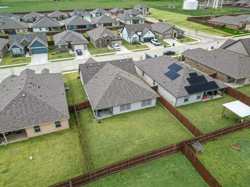 Birds eye view of property with a residential view