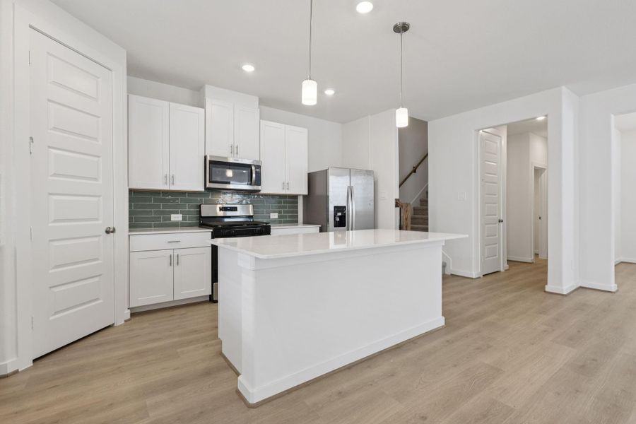 Furnished interior view inside a new home in Pine Lake Cove - Traditional Series, Montgomery (Image 5).