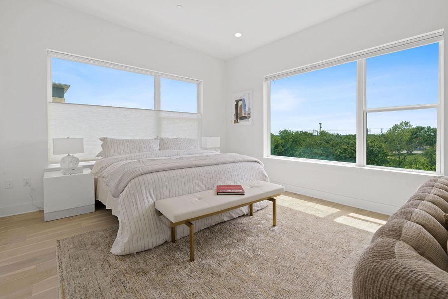 Bedroom featuring light wood-style floors and recessed lighting