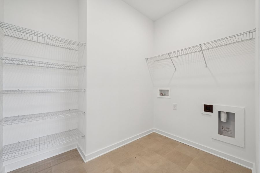 A white room with a white wall.