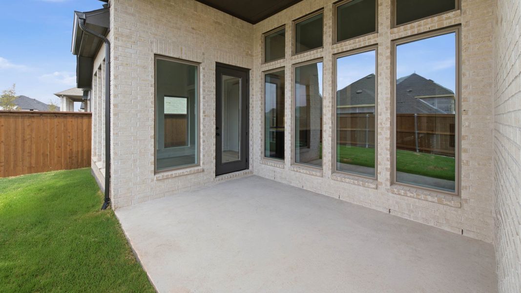 Exterior details and patio area of a home in Mustang Lakes, Celina (Image 4).