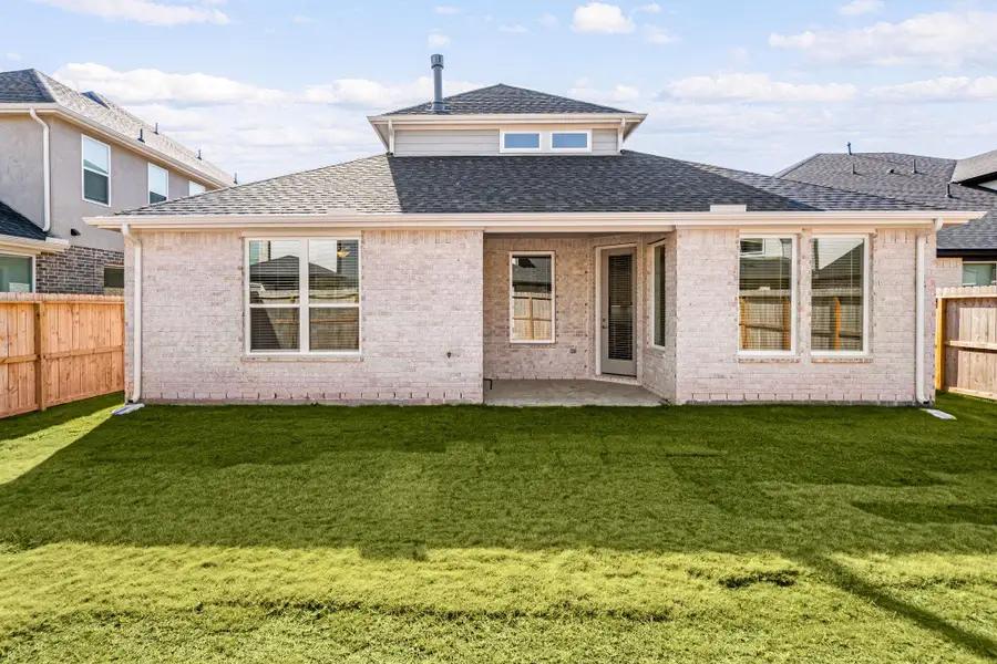 Exterior details and patio area of a home in Harvest Green, Richmond (Image 4). Exterior details and patio area of a home in Harvest Green, Richmond (Image 4).