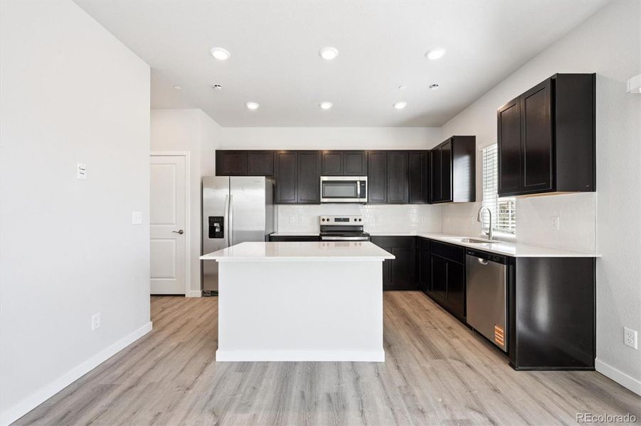 Furnished interior view inside a new home in Legato, Commerce City (Image 8).