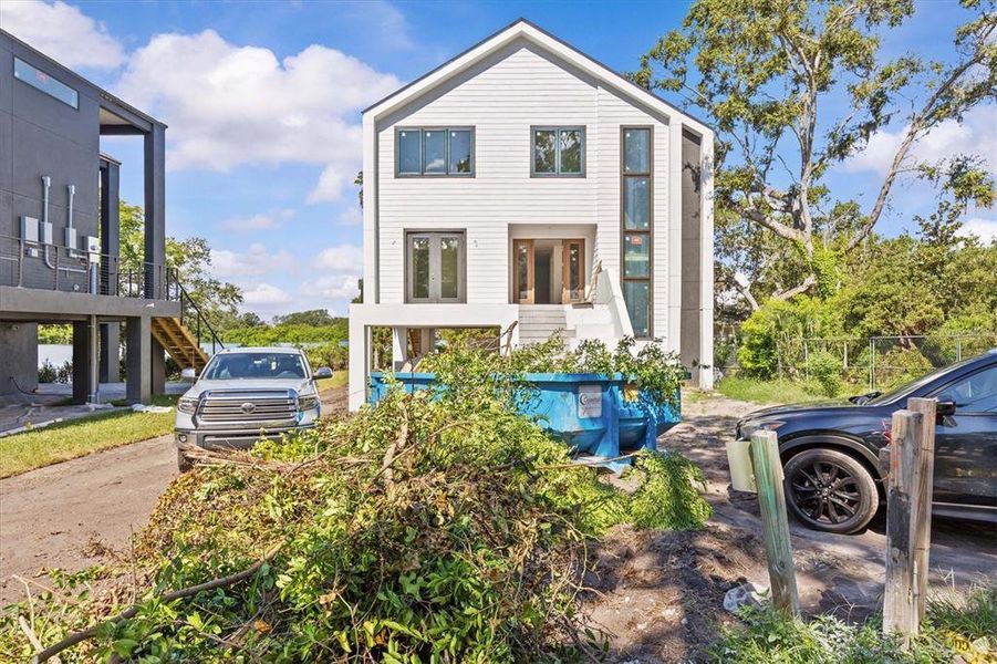 Front exterior of a new home in , Clearwater, FL, highlighting curb appeal (Image 27).