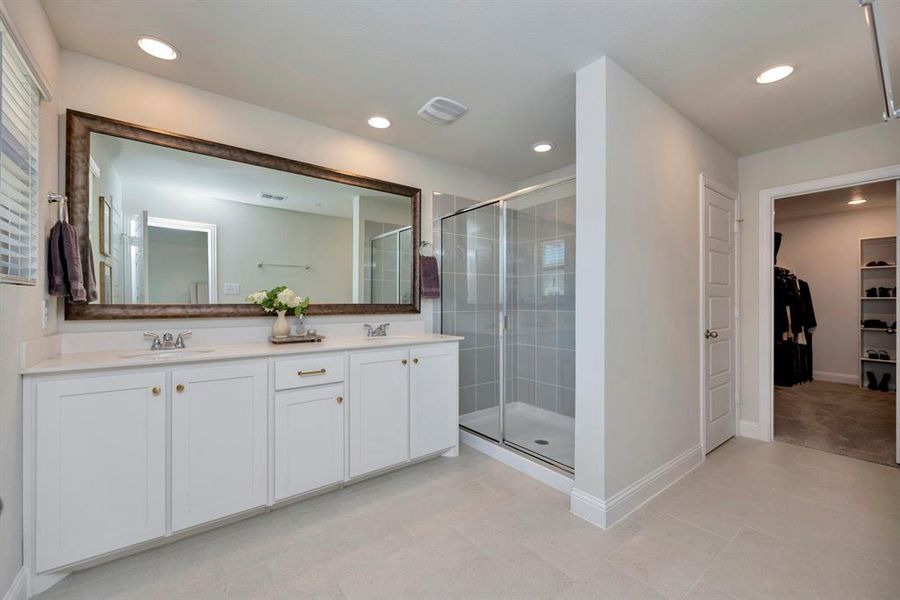 Primary bath with dual sinks and large shower!