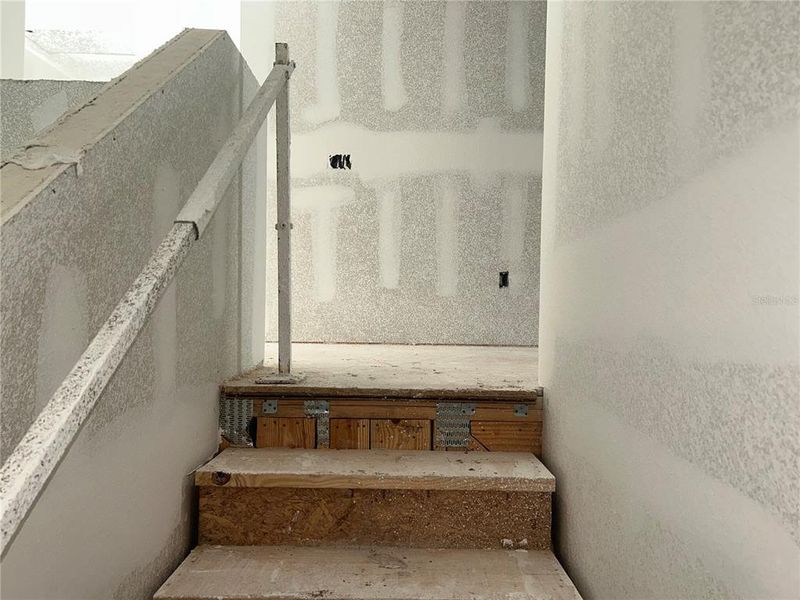 In-progress construction of a new home in Oakfield Trails Signature, Parrish, FL (Image 14).