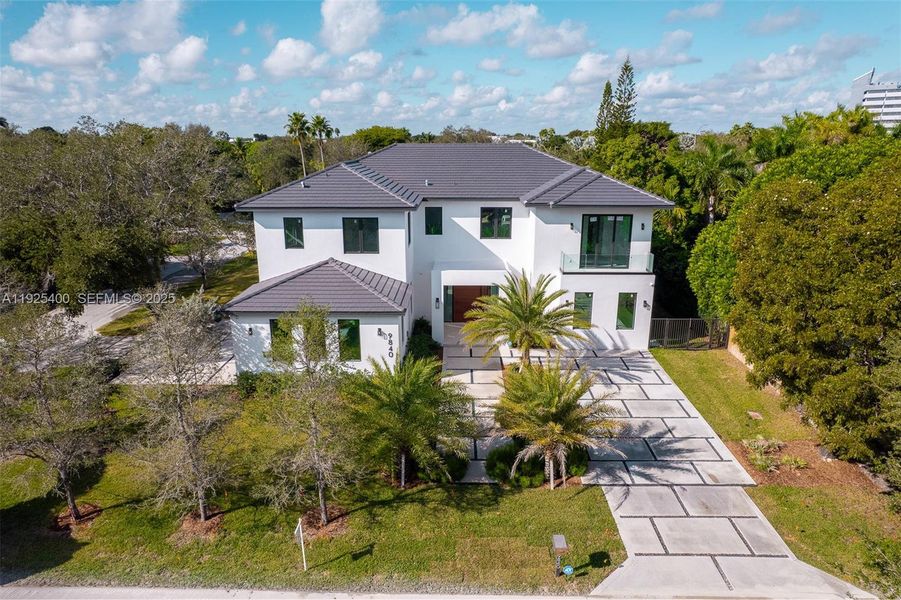 Front exterior of a new home in , Pinecrest, FL, highlighting curb appeal (Image 29).