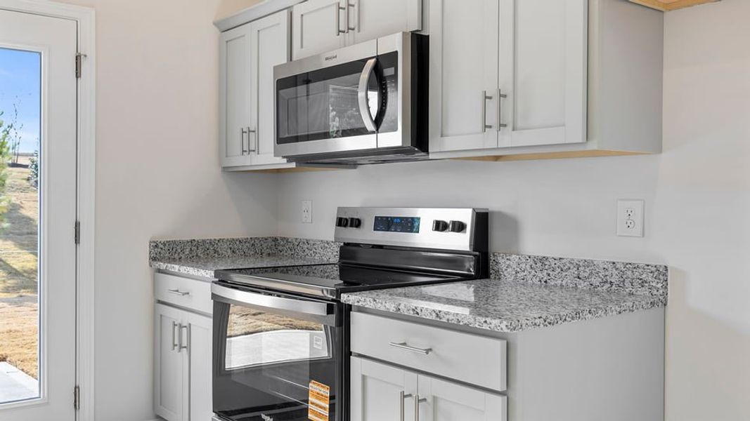 Furnished interior view inside a new home in Brookside Ridge Townhomes, Greer (Image 7). Furnished interior view inside a new home in Brookside Ridge Townhomes, Greer (Image 7).