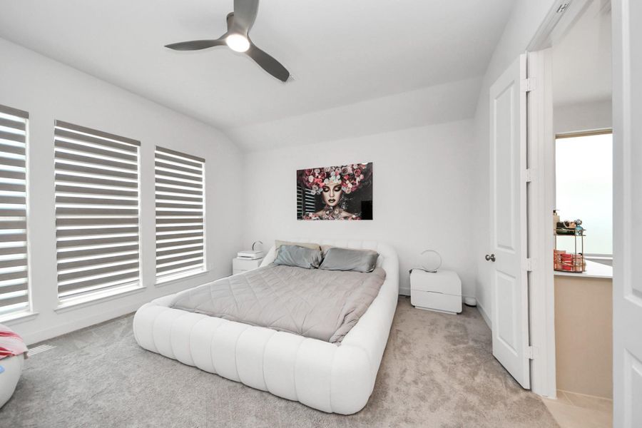 Primary bedroom with the automatic shades!