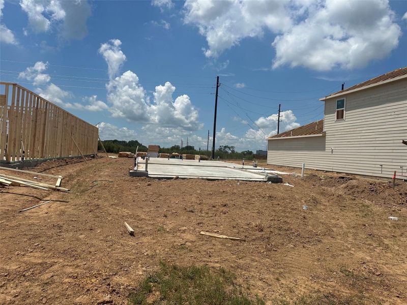 Front exterior of a new home in Laurel Farms, Brookshire, TX, highlighting curb appeal (Image 2).