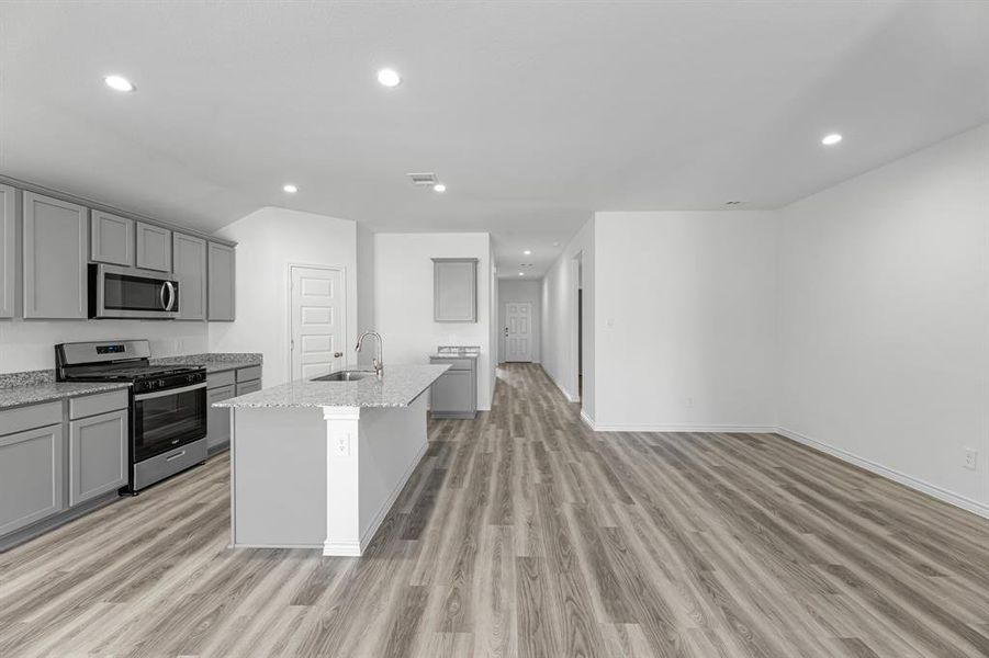 Furnished interior view inside a new home in Reserve at Mallard Lakes, Orange (Image 7). Furnished interior view inside a new home in Reserve at Mallard Lakes, Orange (Image 7).