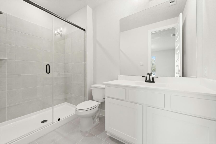 Furnished interior view inside a new home in The Woodlands Hills, Willis (Image 9).