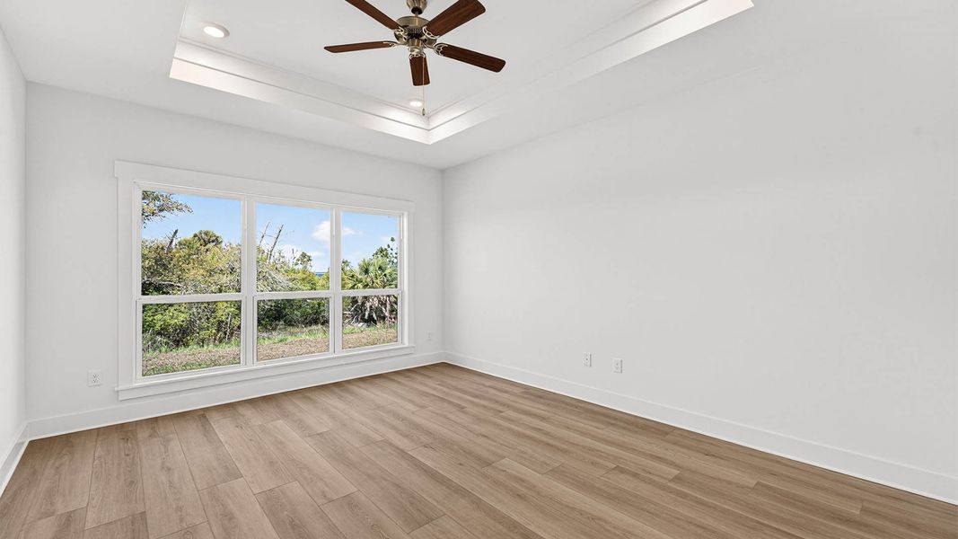 Representative unfurnished interior of a home built from the The Lily by D.R. Horton in WindMark Beach, Port Saint Joe (Image 26).
