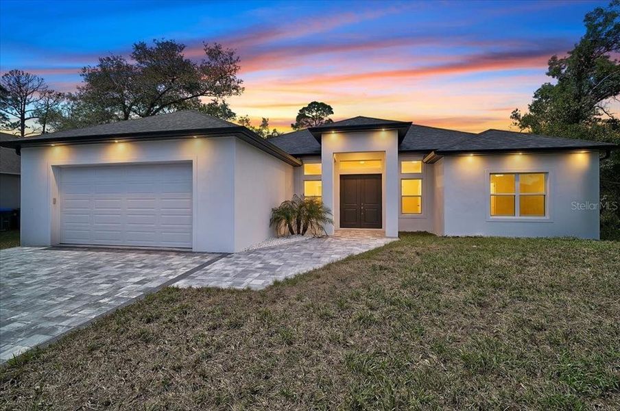 Front exterior of a new home in , North Port, FL, highlighting curb appeal (Image 27).