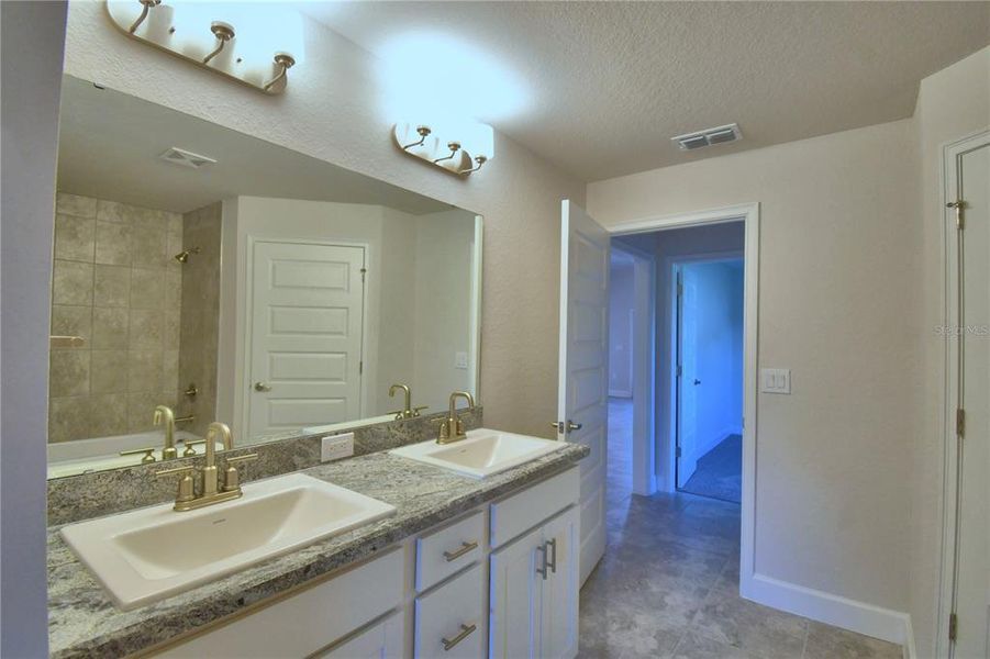 Furnished interior view inside a new home in Cadence Crossing, Auburndale (Image 16).