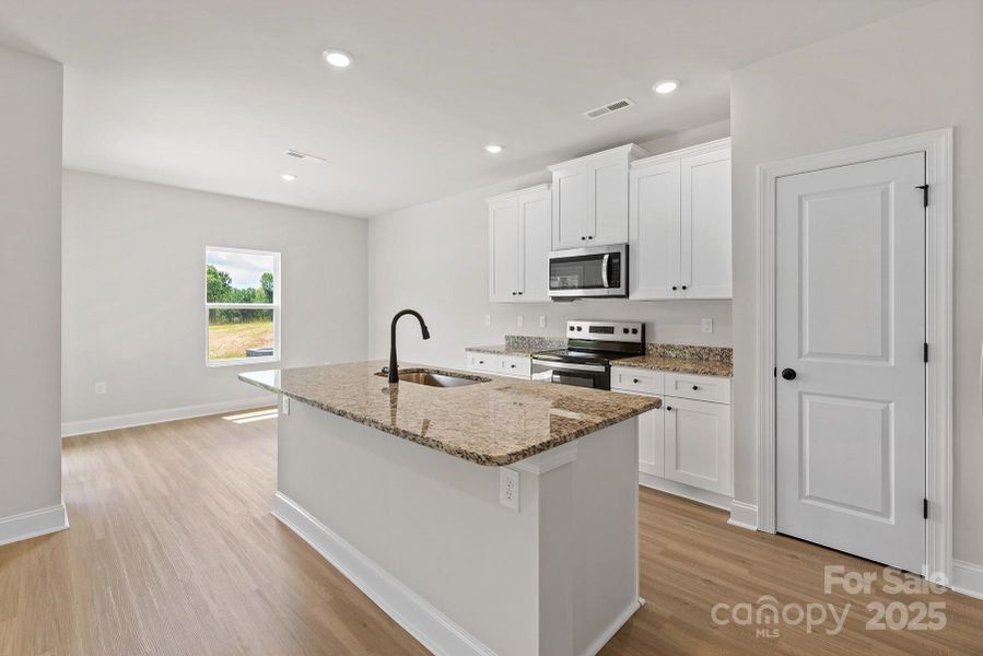 Furnished interior view inside a new home in Ascot Woods, Charlotte (Image 3).