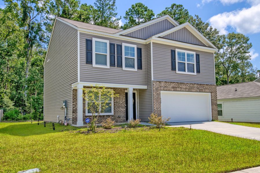 Front exterior of a new home in Stone Ridge, Moncks Corner, SC, highlighting curb appeal (Image 2).