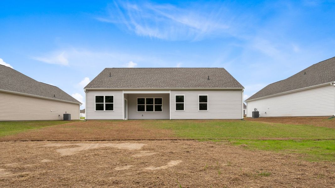 Front exterior of a new home in Villa Grande, Winterville, NC, highlighting curb appeal (Image 22).