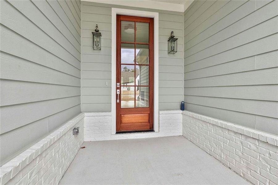 Exterior details and patio area of a home in Gardens at Arbor Springs, Newnan (Image 24).