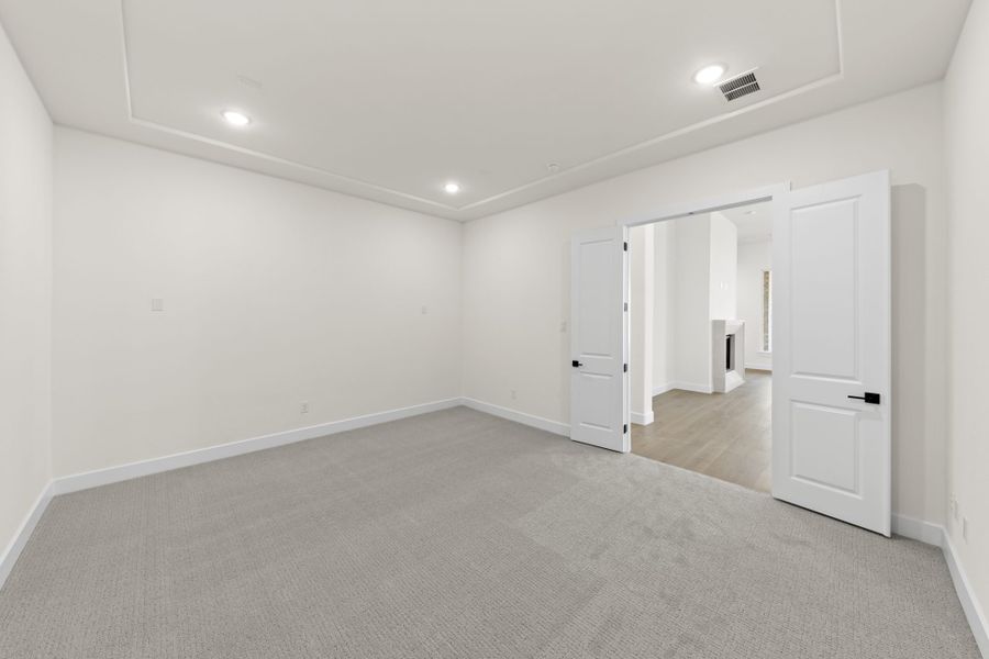 Representative unfurnished interior of a home built from the 5551 by Tradition Homes in Windsong Ranch, Prosper (Image 20).