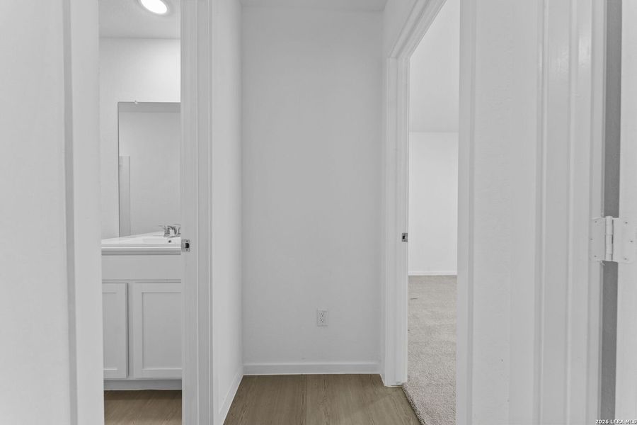 Spacious, unfurnished interior of a new home in Higdon Crossing, San Antonio (Image 11).