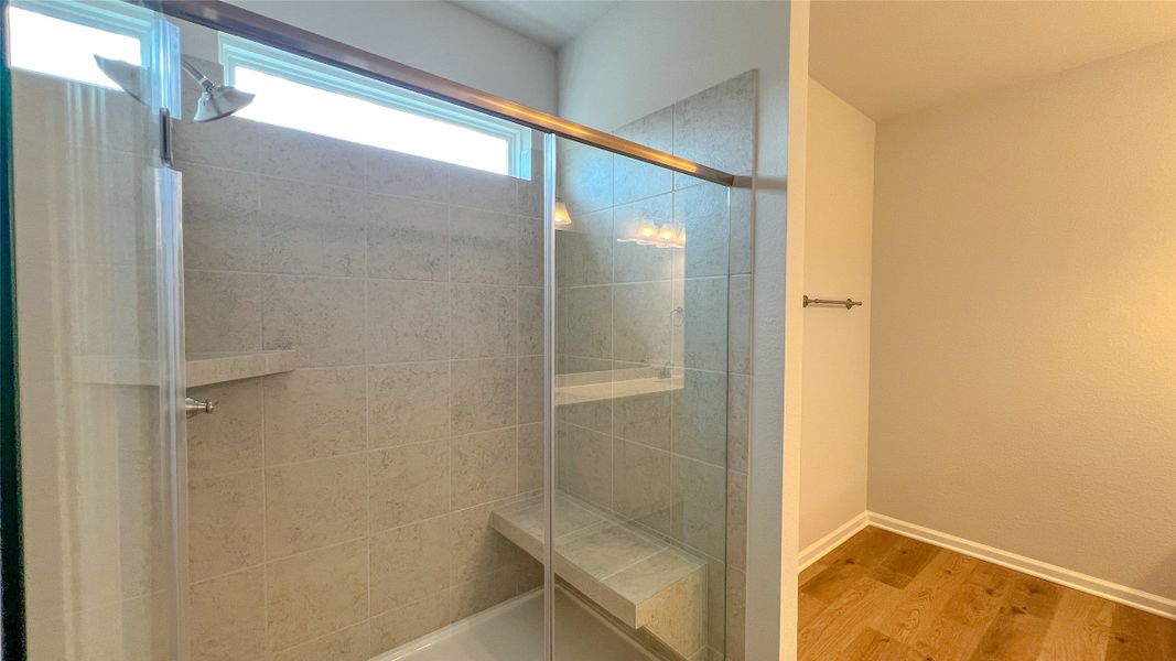 The Brambling- Primary bathroom with Walk-In Shower. Sample floor plan image for illustration; upgrades, options, and colors may vary.