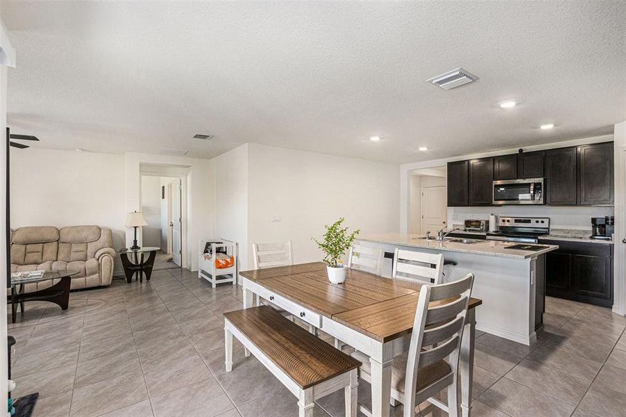 Furnished interior view inside a new home in Fairways at Twisted Oaks, Beverly Hills (Image 9).