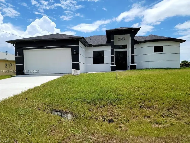 Front exterior of a new home in , Lehigh Acres, FL, highlighting curb appeal (Image 1). Front exterior of a new home in , Lehigh Acres, FL, highlighting curb appeal (Image 1).
