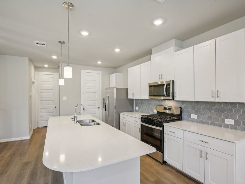 Furnished interior view inside a new home in Spring Brook Village - City Series, Houston (Image 3).