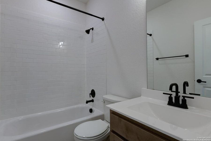 Furnished interior view inside a new home in Megan's Landing 50's, Castroville (Image 7).