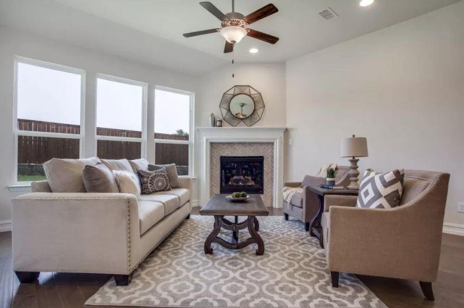 Photo of Pulte model home with same floor plan, not of actual home listed.