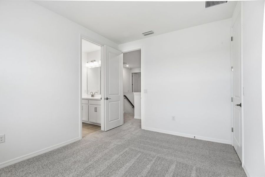 Representative unfurnished interior of a home built from the Barbados by Taylor Morrison in Ardisia Park, New Smyrna Beach (Image 39).