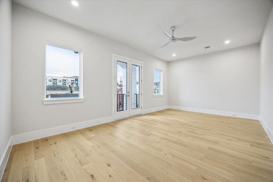 Third bedroom - located on the third floor. It has a walk-in closet and access to a private balcony. Third bedroom - located on the third floor. It has a walk-in closet and access to a private balcony.