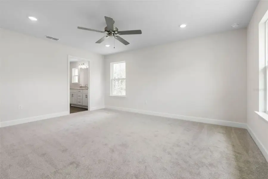 Representative unfurnished interior of a home built from the 2117 by Adams Homes in Flagler Estates, Hastings (Image 24).